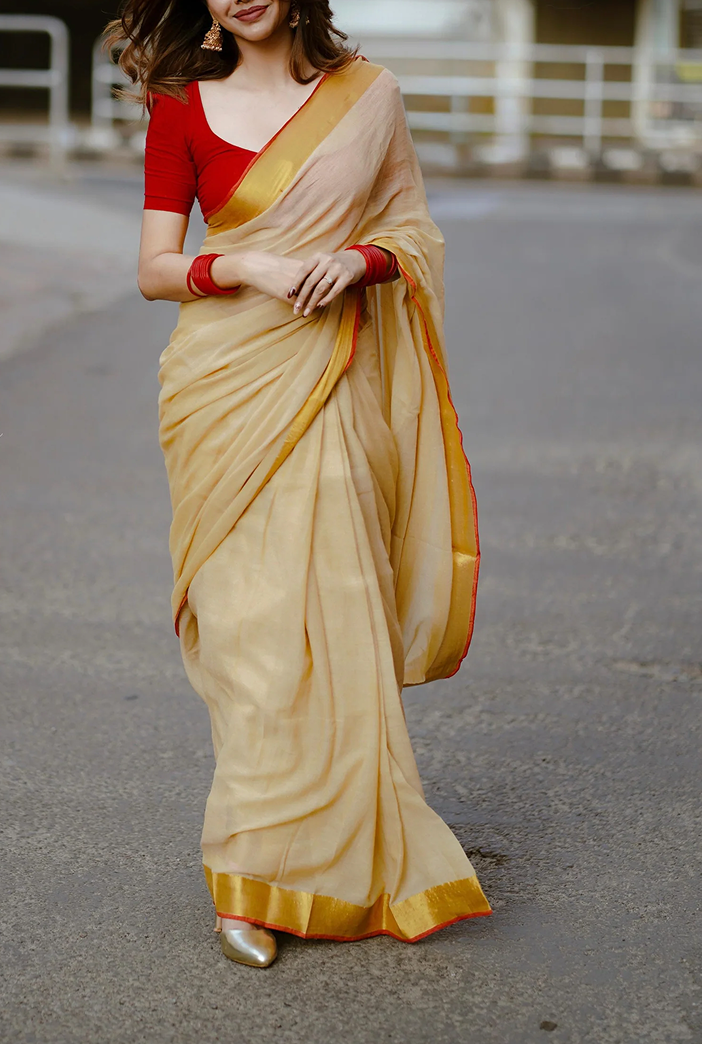 120 Count Beige Mul Cotton Saree with Gold Zari Border & Handmade Red Tassels MJ150